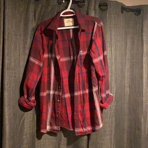 Shades of red button up flannel.
